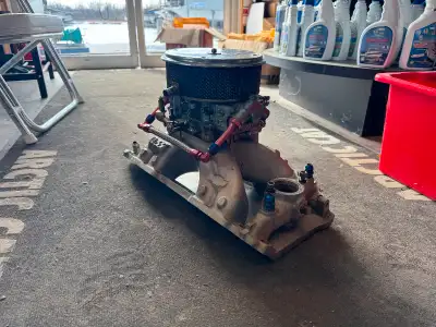 GM Performance Single Plane Intake Manifold Topped with a Holley 850CFM 4150 Carburetor Includes Eve...