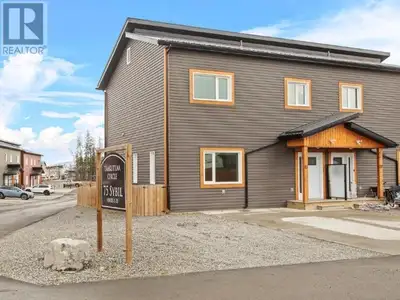 Embrace modern living in Whistle Bend with this stylish and budget-friendly townhome! Offering a spa...
