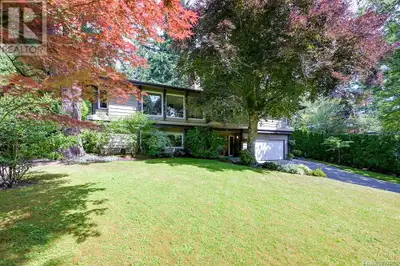 Exceptional Broadmead Residence! An extremely private oasis set high and back on a large lot with ma...