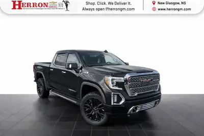 Command the road in this 2021 GMC Sierra 1500 a full-size pickup that blends rugged capability with...