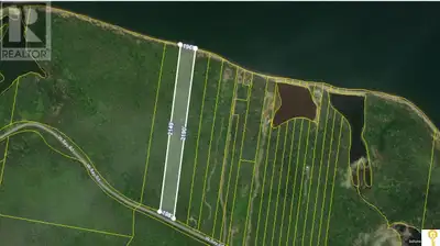 This 10-acre north facing parcel offers the perfect blend of space, privacy, and waterfront lifestyl...
