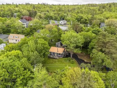 This thoughtfully updated two-bedroom home offers ocean views on a beautiful, landscaped lot - all s...