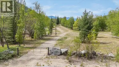 Incredible 76.26 acres of land zoned RUR1 only 10 minutes from Downtown Trail. 7 separate lots rangi...