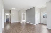 Amenities: In-suite Laundry • Security Cameras • Single or Double Car Garages Suite & Building: Two-... (image 6)