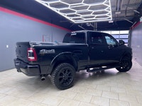 The 2019 Ram 2500 Laramie, with its bold black exterior and sophisticated 4x4 drive, promises except... (image 1)