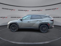 This Hyundai Tucson has a strong Gas 4cyl 2.5 L engine powering this Automatic transmission. Black L... (image 4)