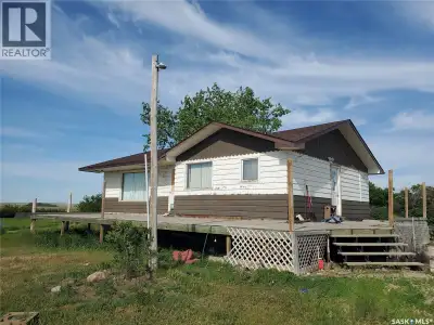 Enjoy peaceful country living with gorgeous sunrise and sunset views from the wraparound deck of thi...