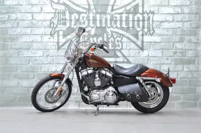 ONLY 10,258 km on this super clean, and un-touched, 2014 Sportster Seventy-Two XL1200V! Senior owned...