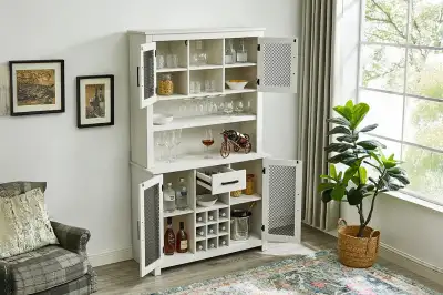 This versatile storage piece features ample space with two cabinets, open shelves for display, a bui...