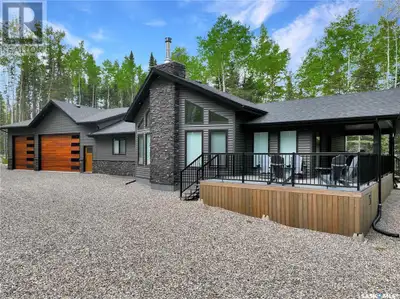 Secluded & hidden gem with the Ultimate Garage! Welcome to 306 Meadow Ridge Drive in the Aspen Ridge...