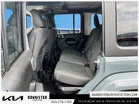 Step into adventure with the 2024 Jeep Wrangler 4xe Sport S, a versatile SUV in a stunning silver fi... (image 7)