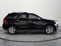 The 2015 Chevrolet Equinox LT is a comfortable and practical SUV that's perfect for commuting, road... (image 6)