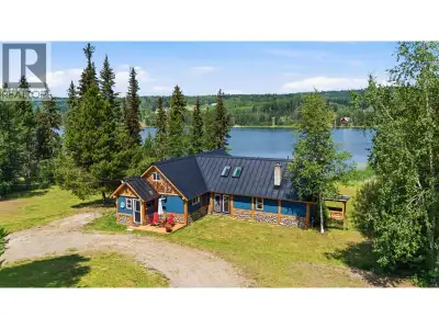 Lakefront gem on 2.26 acres of beautifully maintained, level land on Rose Lake. This charming proper...