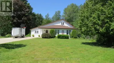 Nestled on a peaceful residential street in the beautiful shoreline community of Southampton, this c...