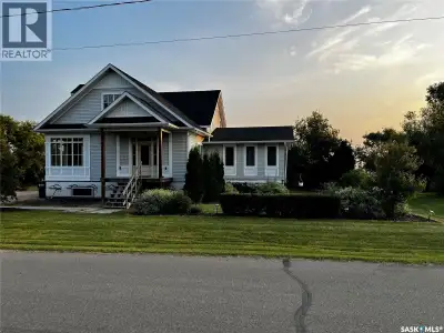 ACREAGE LIFE WITH TOWN CONVENIENCES AT 1306 ASSINIBOIA AVE. Set on the edge of Grenfell this delight...