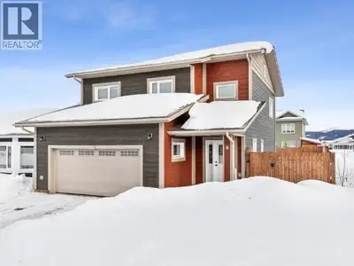 Perfect Family Home! Ideally located across from a park & just around the corner from Whistle Bend E...