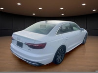 Drive in style with the 2023 Audi A4 Sedan Komfort 45 TFSI quattro, featuring an elegant white exter... (image 5)