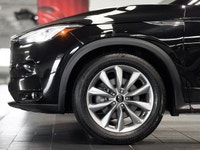 The 2021 INFINITI QX50 Essential is a premium-mid-level trim that elevates the compact luxury SUV ex... (image 7)