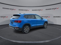 // ACCIDENT FREE!! // Finished in Blue with a Black interior, this 2023 Volkswagen Taos Comfortline... (image 7)