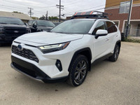 **WE WILL BEAT ANY DEALER IN THE CITY** Recent Arrival! Wind Chill Pearl 2024 Toyota RAV4 Hybrid Lim... (image 1)
