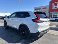 Command every journey in the 2024 Honda CR-V Hybrid EX-L, a stunning Sport Utility finished in prist... (image 6)