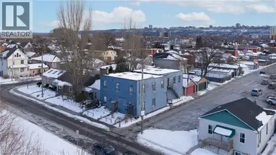 Stunning modern multi-family residence! This property boasts 10-foot ceilings, high-quality 3’ x 6’...