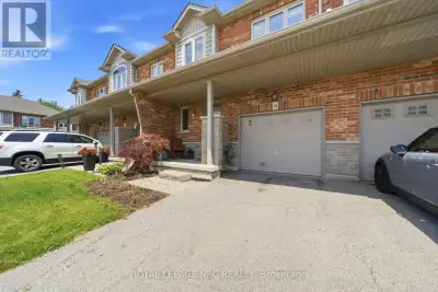 Welcome to this beautifully maintained 3-bedroom townhome located in Grimsby's highly desirable Lake...
