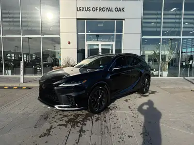 Curbside, this 2026 Lexus RX350 F SPORT 3 expresses its sophisticated style with a sleek body design...