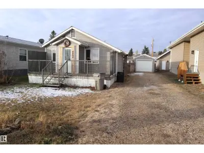 This cozy home has vinyl plank throughout, decks, a large fenced yard, and a Storage garage. Inside...