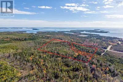 Property Highlights Over 23 Acres on Marine Drive (Trunk 7) Size: 23.89 acres of mature forest (spru...