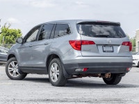 Discover spacious versatility and dependable capability with the 2017 Honda Pilot V6 LX. Finished in... (image 4)