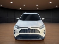 Presenting the 2019 Toyota RAV4 AWD Limited in a pristine white finish, perfect for tackling Canadia... (image 2)