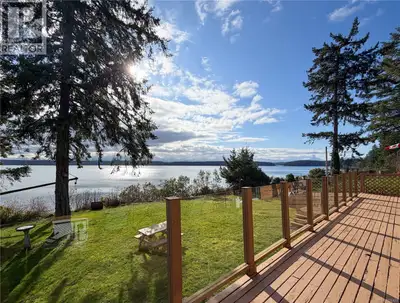Enjoy south-facing waterfront living with expansive ocean views across to the outer Gulf Islands and...