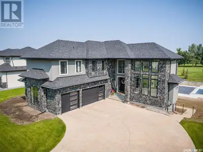Welcome to luxury living at its finest in Saskatoon's premier neighbourhood, Greenbryre Estates! Thi...