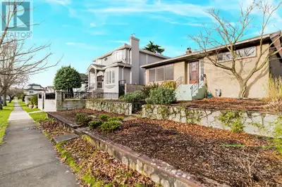 This partially updated 4-bedroom home sits on a quiet, south-facing lot between Main and Cambie Stre...