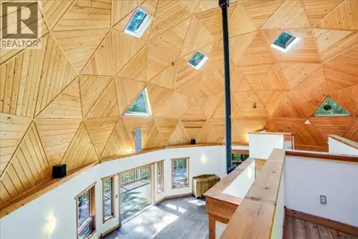 Welcome to your private retreat! Nestled on a 22-acre forested sanctuary just 20 minutes from Nelson...