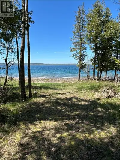 Are you searching for a peaceful retreat or a beautiful place to call home? This spacious 4-bedroom,...