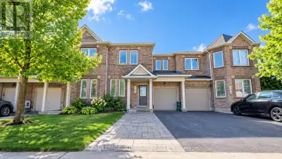 Welcome to 148 Grovemont Drive, a bright, spacious, and beautifully maintained CARPET-FREE townhouse...