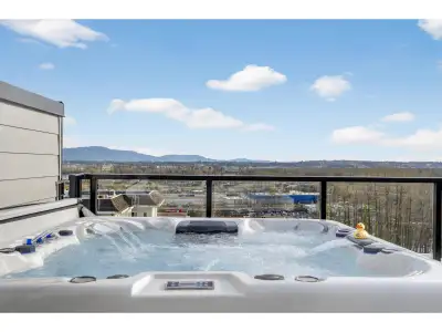 ROOFTOP DECKS engineered for hot tubs w/ Mnt/River/Valley views! SKYVIEW Townhomes. Where modern des...