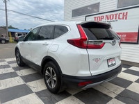 A practical compact SUV with a spacious interior, efficient performance, and modern safety features,... (image 5)