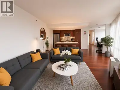 Live in the heart of downtown in this quality Cressey-built home. This bright, south-west facing 2 b...