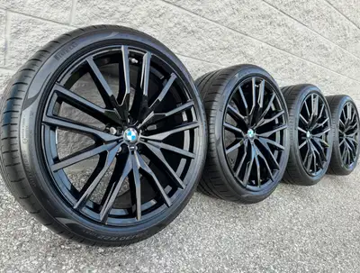 Pirelli PZero PZ4 Summer Tires and original 22 inch BMW X5 / X6 'Style 742M' Staggered Gloss Black R...