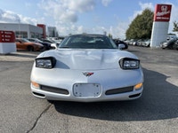 Turn heads in this sleek 1999 Chevrolet Corvette, boasting a stunning Sebring Silver Metallic exteri... (image 1)