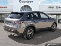Engineered for the demands of the open road and city streets alike, this sleek gray 2025 Honda HR-V... (image 5)