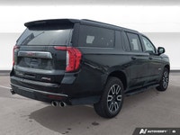 Experience the premium capability and rugged refinement of the 2023 GMC Yukon XL AT4. This used full... (image 5)