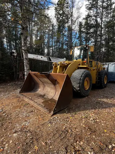 2000 CAT 980G recent pins and bushings and motor rebuild. Snow pusher available at extra cost.