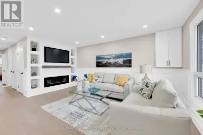**Exceptionally Stunning Legal Duplex Bungalow in a Highly Desirable Neighborhood!** This luxurious...