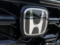 The 2026 Honda CR-V Hybrid Touring AWD in a stunning White finish is revolutionizing the SUV experie... (image 8)