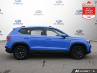 New Price! Odometer is 10494 kilometers below market average! Blue 2024 Volkswagen Taos Comfortline... (image 7)