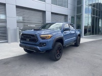 AMVIC Licensed Dealer The 2018 Toyota Tacoma TRD Off Road 4x4 Double Cab, finished in Blazing Blue M... (image 3)